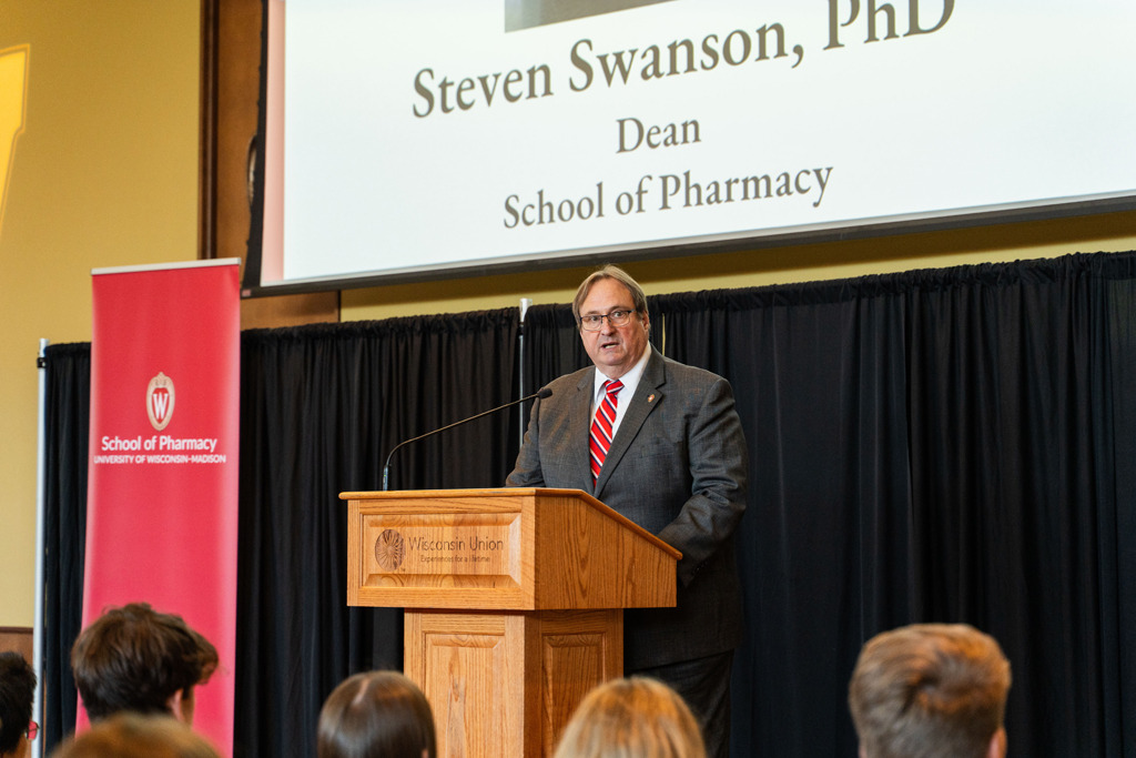 Photo by Paulius Musteikis Steve Swanson, dean of the School of Pharmacy, speaks at the podium