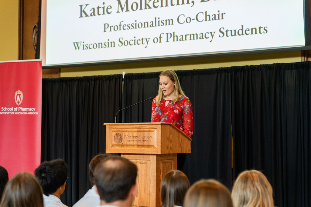 2024 White Coat Ceremony Katie Molkentin speaks at a podium
