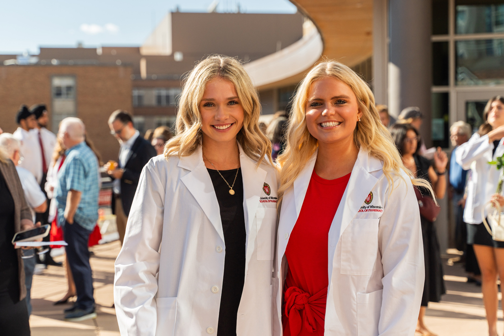 Photo by Paulius Musteikis Two female students pose for a photo outside
