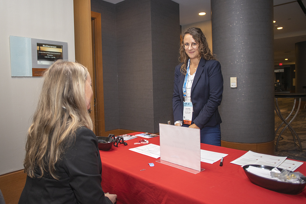 039WU-Boston10-17-22-Osberg Valentina Troiss checking in to the event.