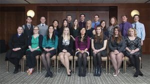 2015 Rho Chi DPH-2 student inductees take time for a group photo at the initiation event held March 1 at Union South, UW-Madison. Pictured above, front-back, left-right: Row 1: Rachael Nellessen, Kate Rolling, Rachel Sands, Lindsey Splinter, Irene Chung, Greta Pietraszek, Erika Bauer, Emily Jackson. Row 2: Eric Chmielewski, Andrew Cannon, Zaifang Huang, Lucy Xiao, Catherine Kuecker, Margaret Shuda, Heejee Jeon, Katherine Zaborowski, Benjamin Heikkinen, Cory Bowers. Row 3: Jonathin Flury, Casey Paplow, Nathan Menninga. Not pictured: DPH-2 students: Dustin Fredrickson, Briana Frolov, Hailey Keeser, Sarah Maerzke, Daniel Rosin. Faculty advisors: Mary Hayney, professor (CHS), Pharmacy Practice Division, Warren Rose, associate professor (CHS), Pharmacy Practice Division.