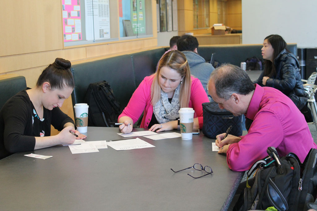 Thank a Badger Day with staff filling out cards