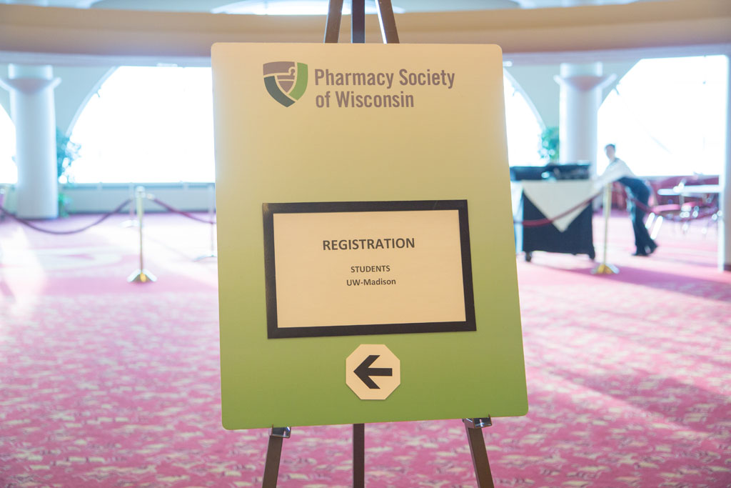 20180208-IMG_3443 Sign board from Pharmacy Society of Wisconsin that says "Registration" with "Students UW-Madison" below it