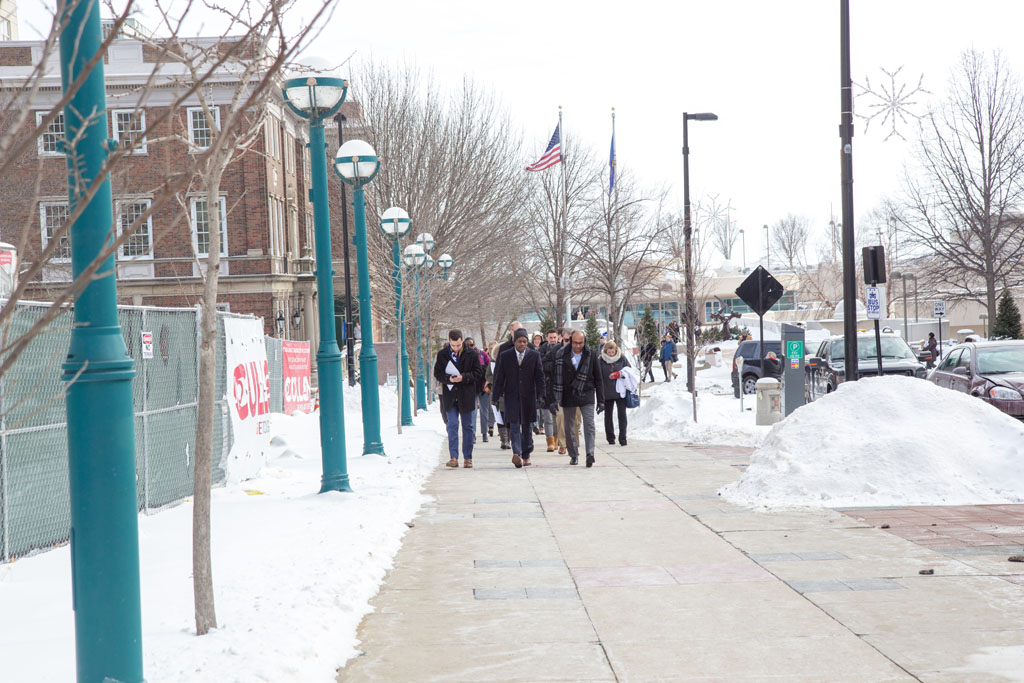 20180208-IMG_3648 School of pharmacy group walking along sidewalk in cold weather