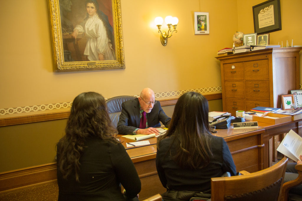 20180208-IMG_3680 Pharmacy students listening to a legislator at his desk
