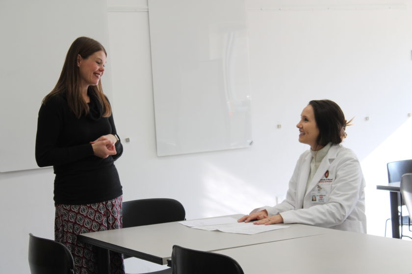 2019-Telepharmacy-Lab-11 Andrea Porter speaking with a pharmacy student during the telepharmacy simulation.