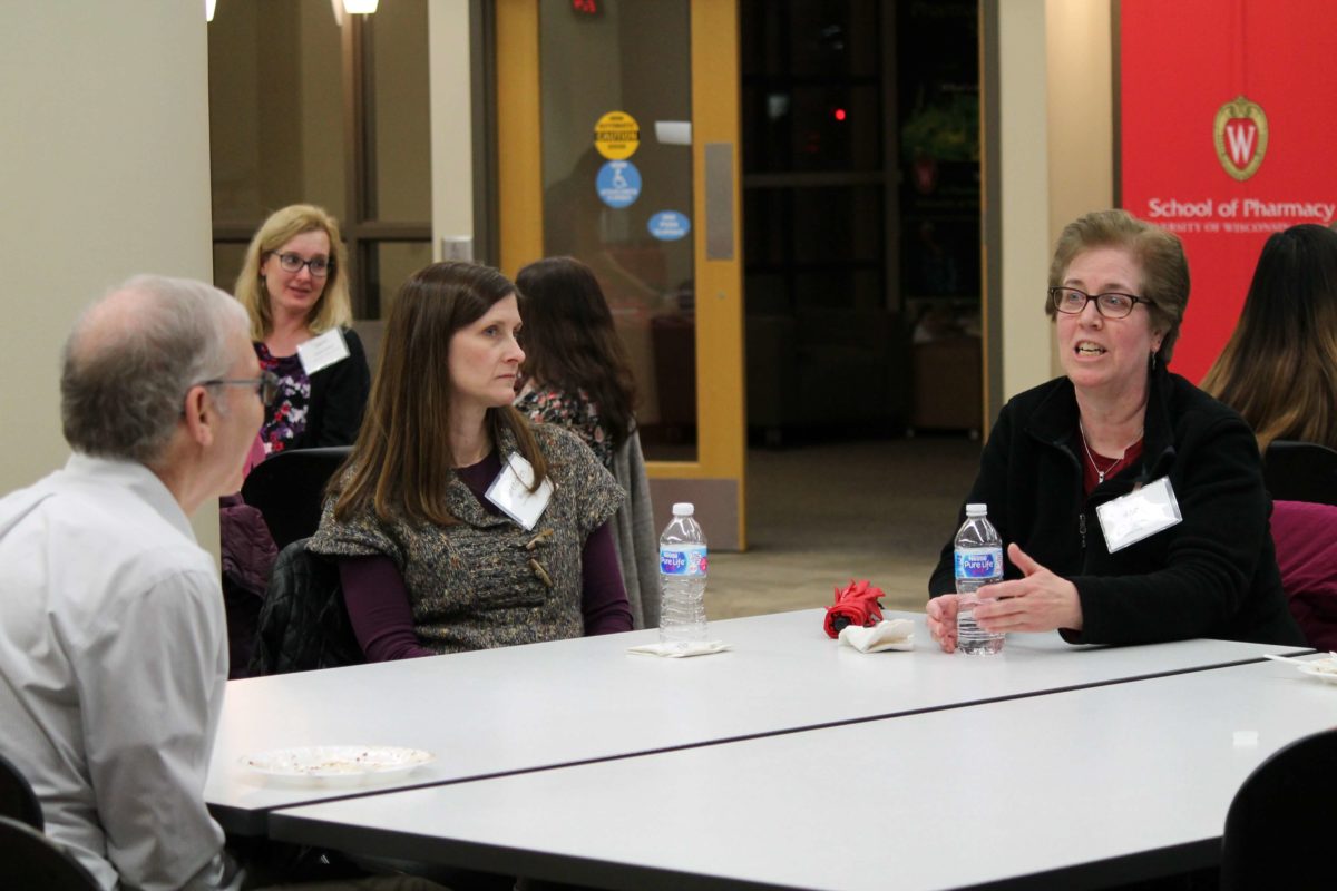 2020-Annual-Clinical-Instructors-Mtg-31 Gretchen Wagner speaking to other health professionals at a table