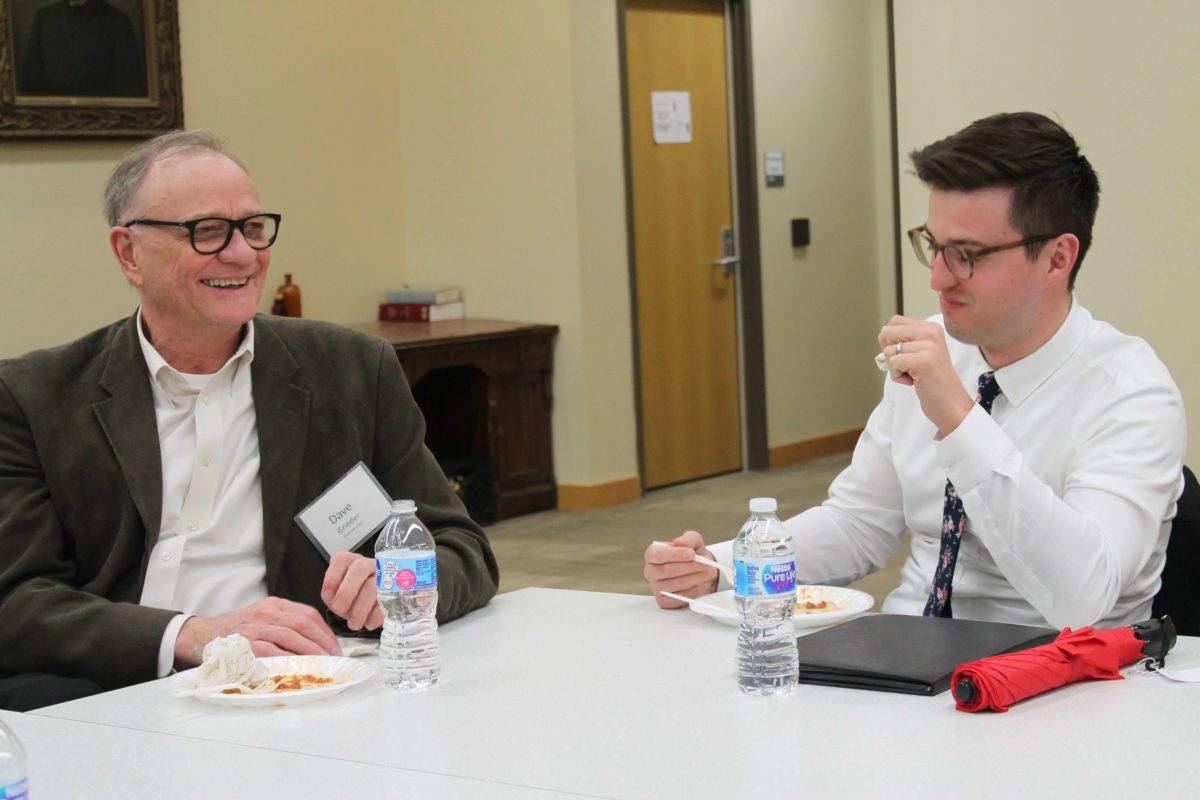 2020-Annual-Clinical-Instructors-Mtg-52 Health professionals eating food from a buffet hosted for the 2020 Annual Clinical Instructors Meeting