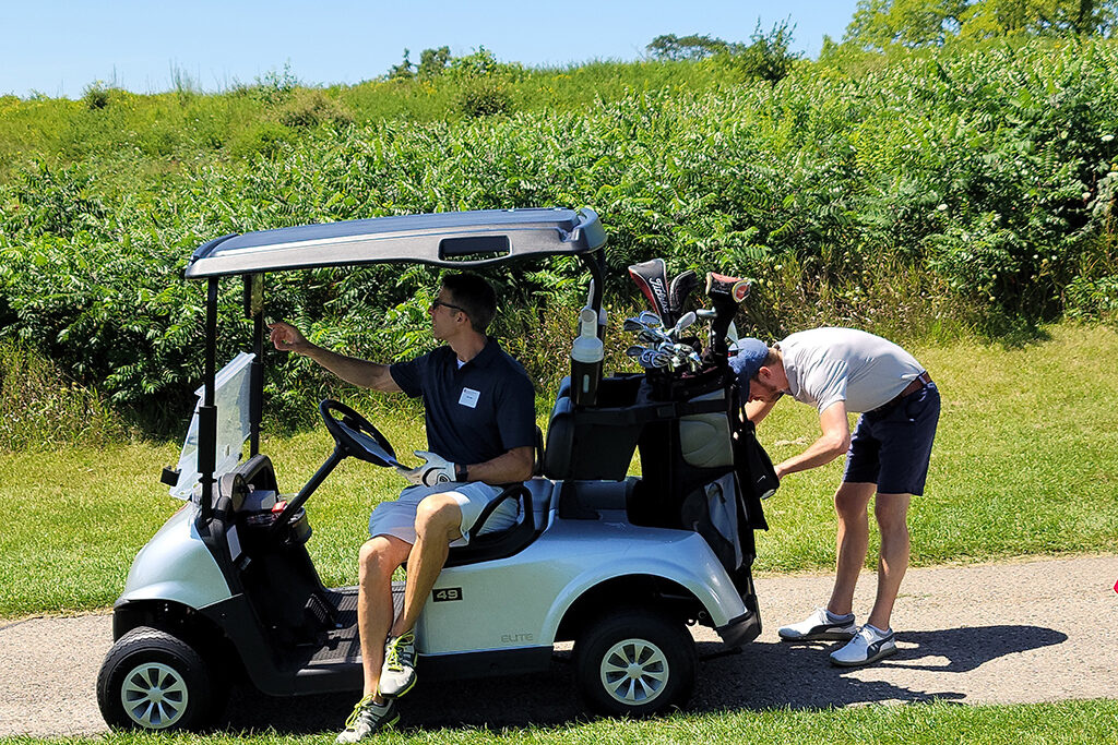 20210813_123745 Pharm alum in a golf cart