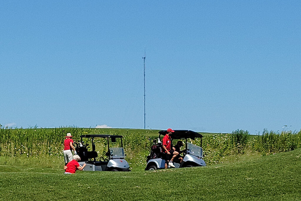 20210813_125222 Pharm Alum gathered near golf carts