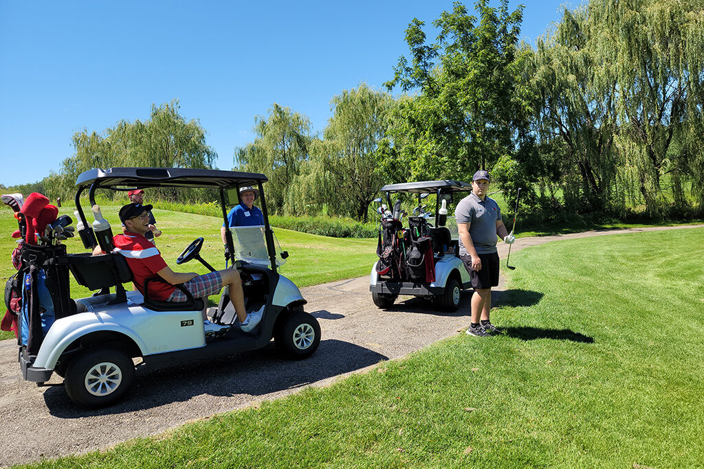 20210813_130041 Pharm Alumni moving around on golf carts