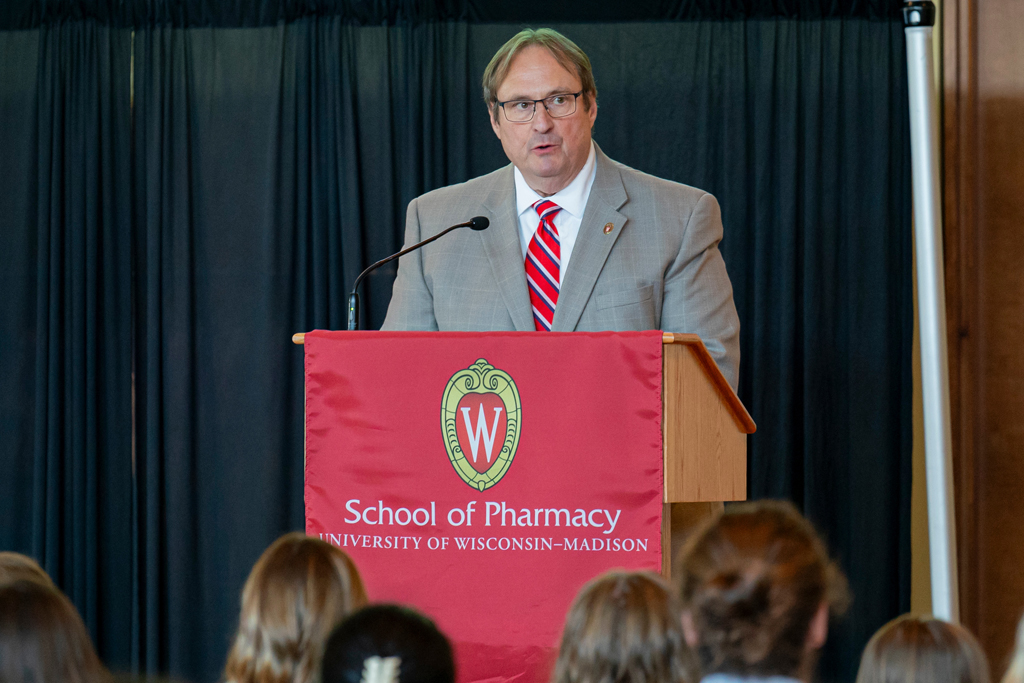 School of Pharmacy White Coat Ceremony Sunday, Sept. 17, 2003. Dean Steve Swanson speaking at podium