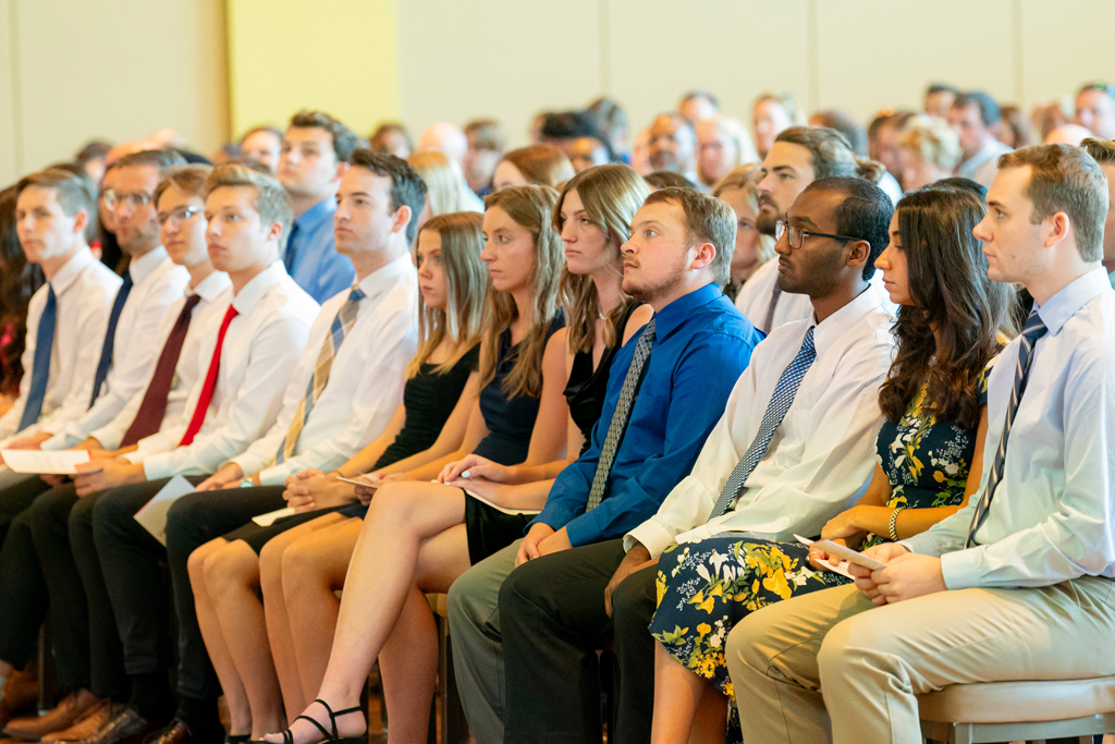 School of Pharmacy White Coat Ceremony Sunday, Sept. 17, 2003. Students sitting in their seats looking at the podium