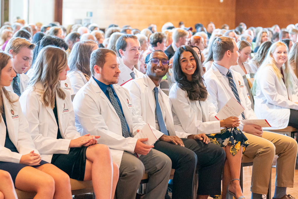 School of Pharmacy White Coat Ceremony Sunday, Sept. 17, 2003. Students sitting with their white coats on