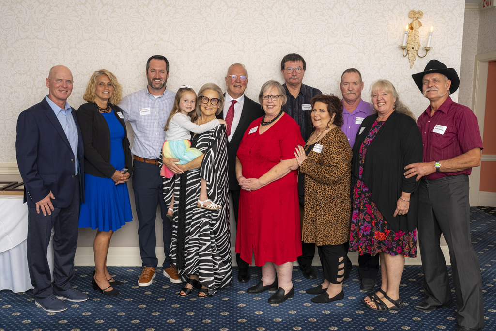 Tom McCourt poses with family