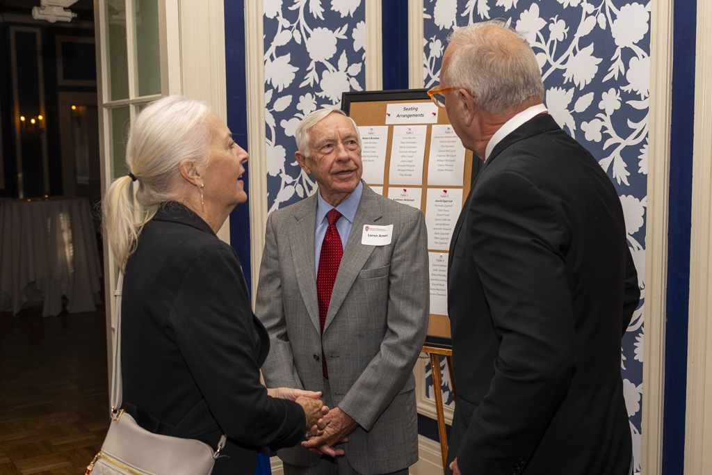 Margaret and Loren Ames speak with Tom McCourt