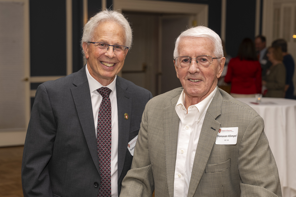 Bob Breslow and Donovan Klimpel smile for a photo