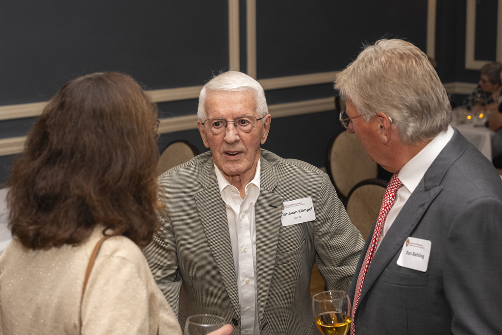 Donovan Klimpel and Don Behling speak with Arlene Iglar