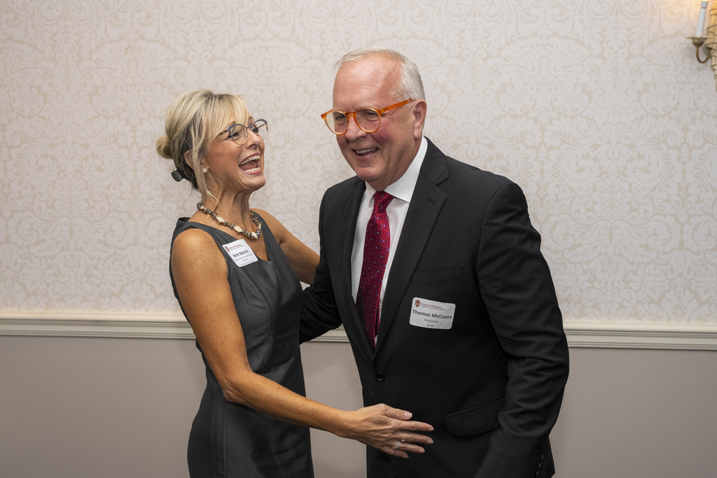 Beth Martin and Tom McCourt laugh together