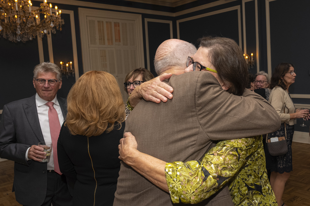 James DeMuth and Ruth Bruskewitz chat hug
