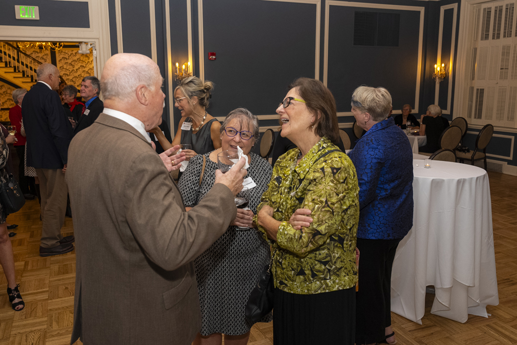 James DeMuth speaks with two Citations attendees