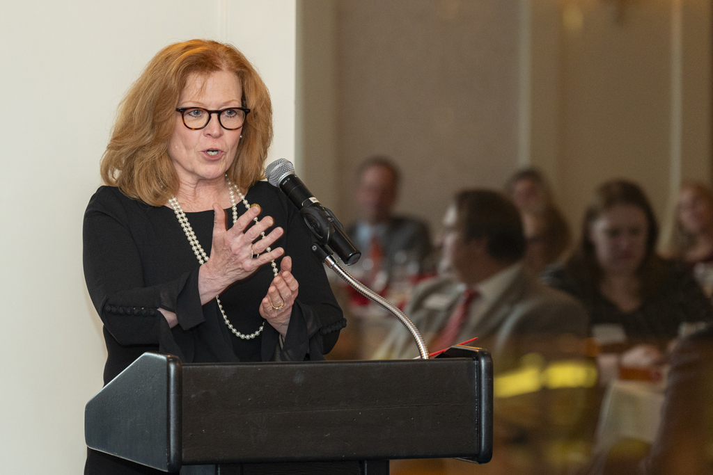 Kathy Skibinski speaking at the podium