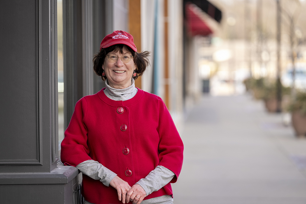 Terri Hix leans against a pillar