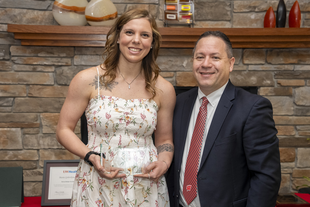 PharmD Graduation Awards Breakfast at the Pyle Center May 10, 2024. Brent Eberle gives a graduate an award