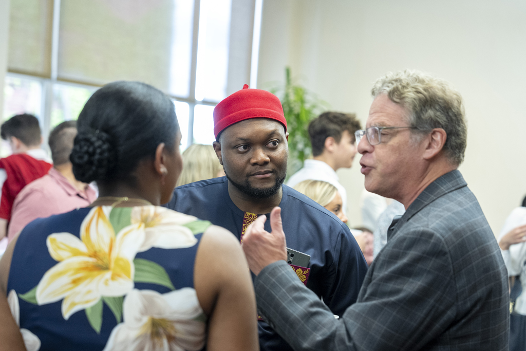 PharmD Graduation Awards Breakfast at the Pyle Center May 10, 2024. Michael Nome and Maria Hill speak with Barry Gidal