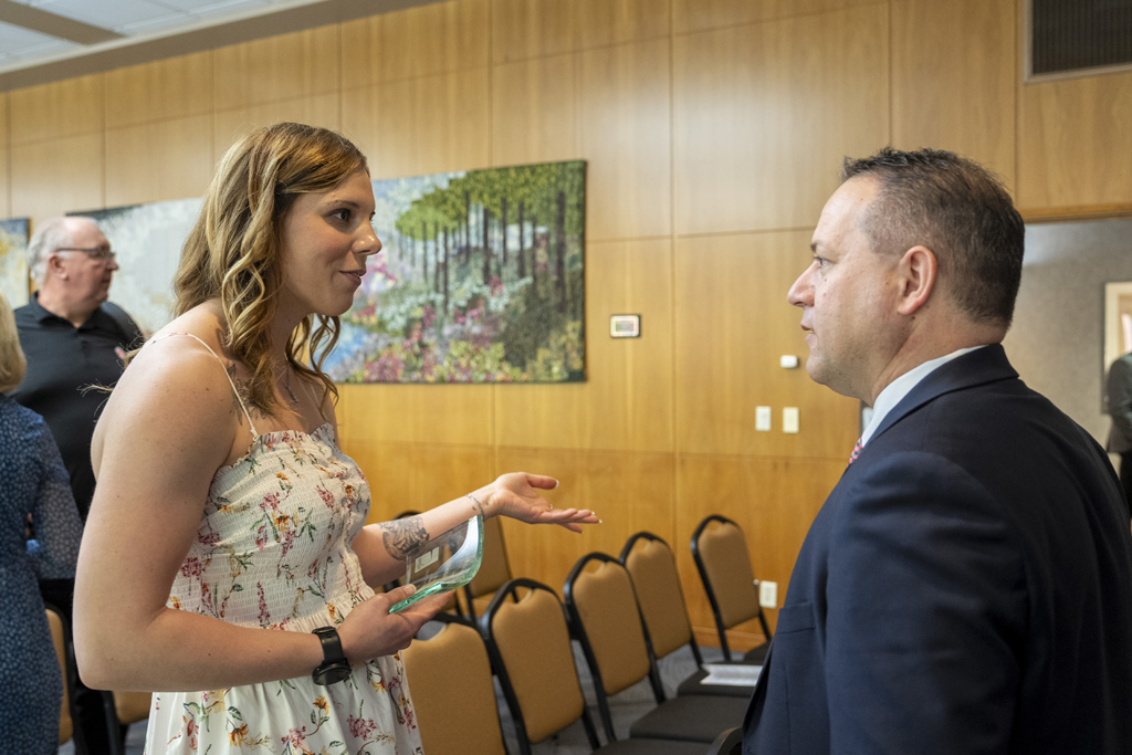 PharmD Graduation Awards Breakfast at the Pyle Center May 10, 2024. Brent Eberle speaks with a graduate