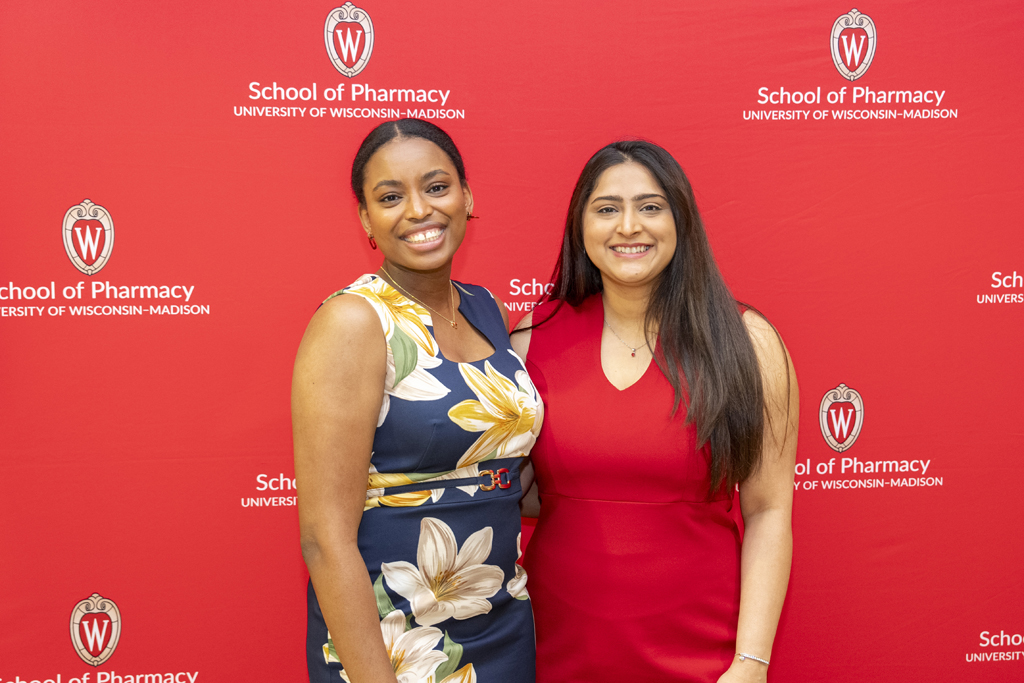 PharmD Graduation Awards Breakfast at the Pyle Center May 10, 2024. Maria Hill and another graduate pose