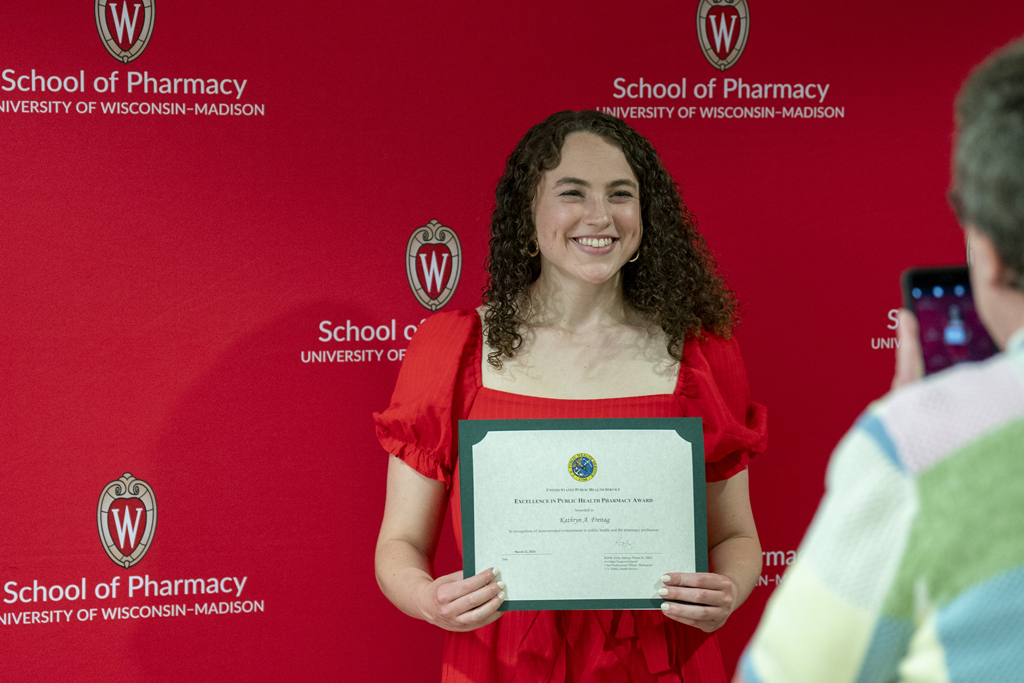 PharmD Graduation Awards Breakfast at the Pyle Center May 10, 2024. Katie Frietag poses with an award