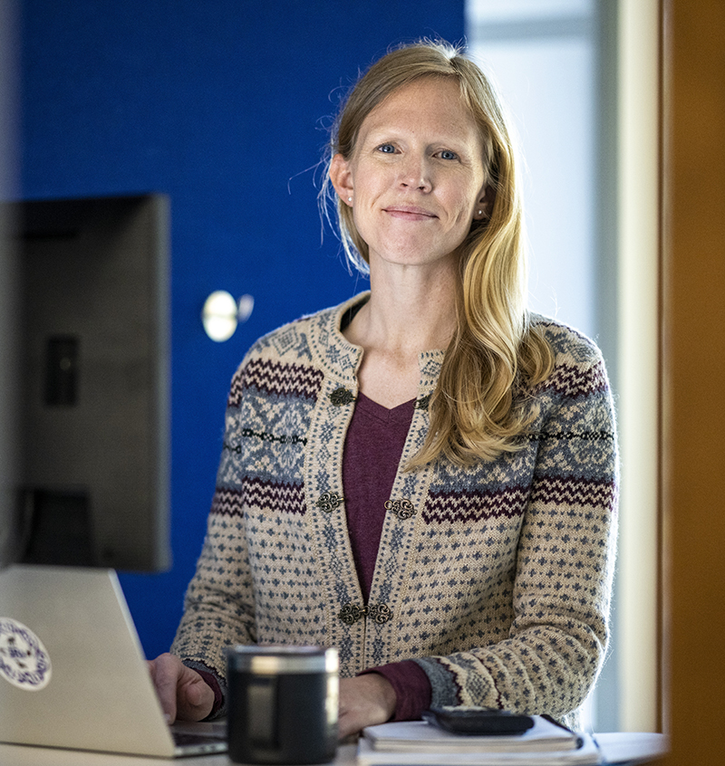 Anna Engstrom working at her desk.