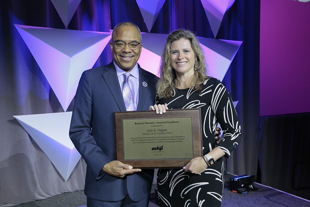 Julie Dagam accepting her ASHP Directors Award.
