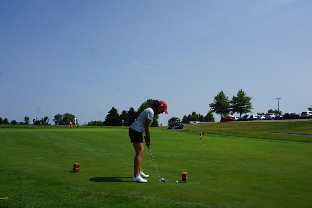 DSC07285 A badger alum getting ready to put a golf ball in