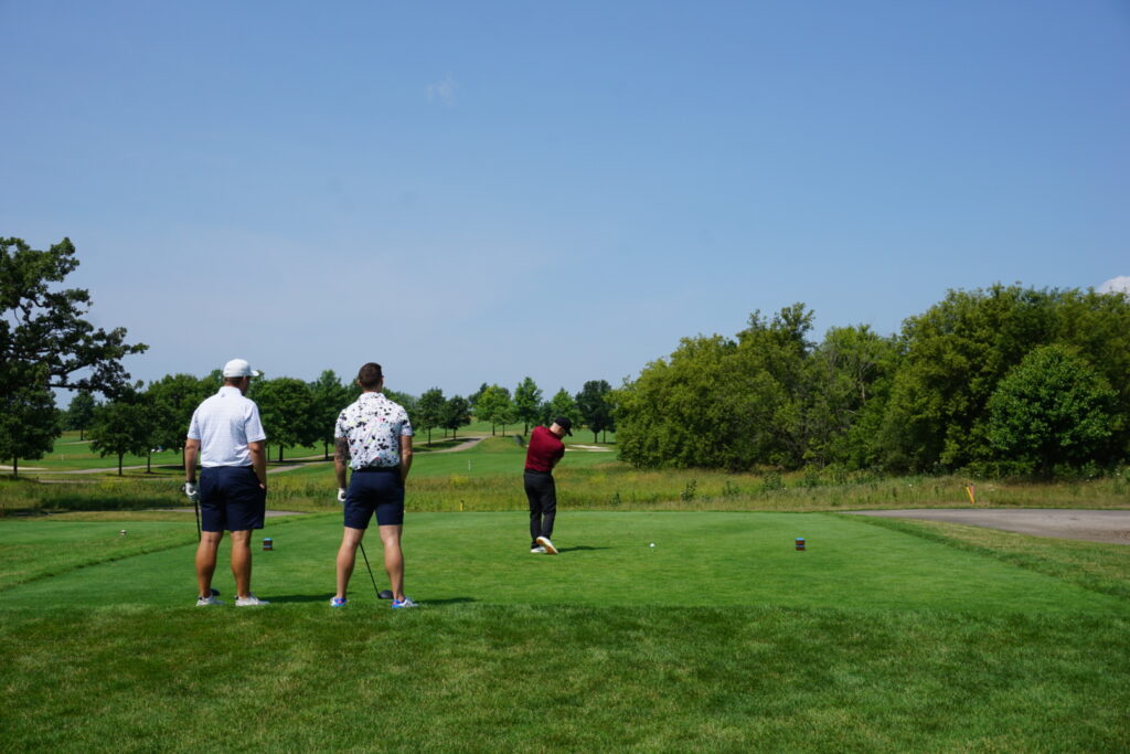 DSC07302 Alumni playing golf at a golf course