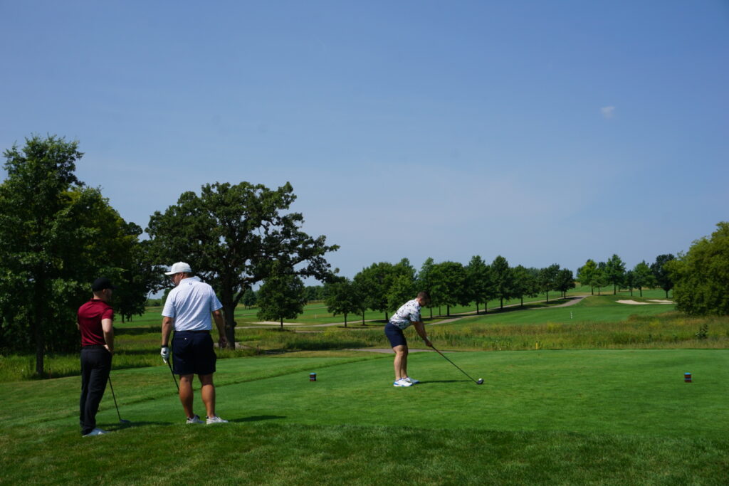 DSC07304 Alumni playing golf at a golf course