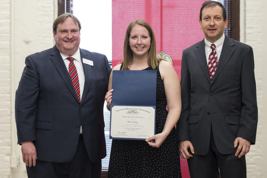 Graduation Awards Celebration_May 2018_PLN3271 Steve Swanson, Olivia Fahey with her award, and Eric Buxton