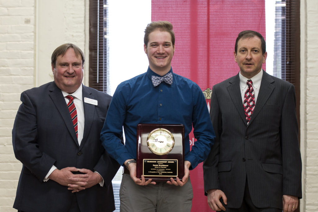 Graduation Awards Celebration_May 2018_PLN3335 Steve Swanson, Daniel Brusch holding his award, and Eric Buxton