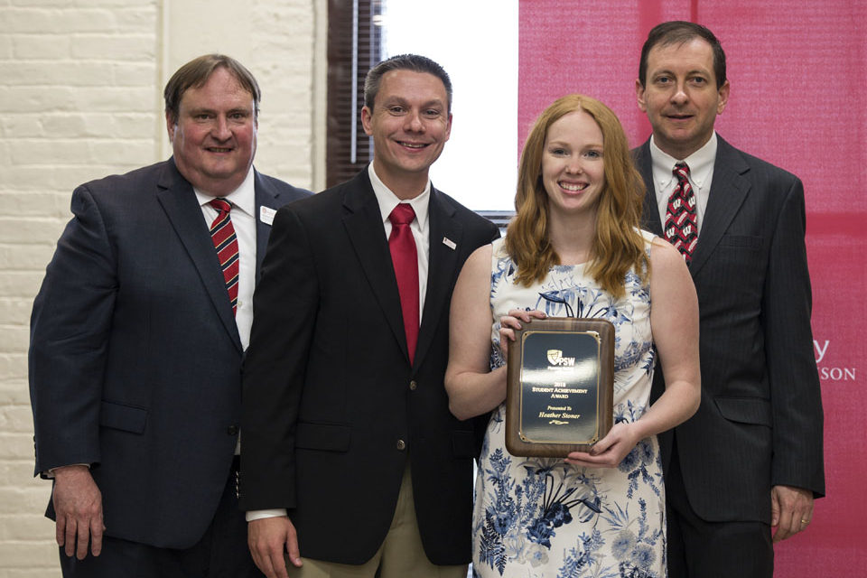 Graduation Awards Celebration_May 2018_PLN3446_1 Steve Swanson, Nick Olson, Heather Stoner with her award, and Eric Buxton