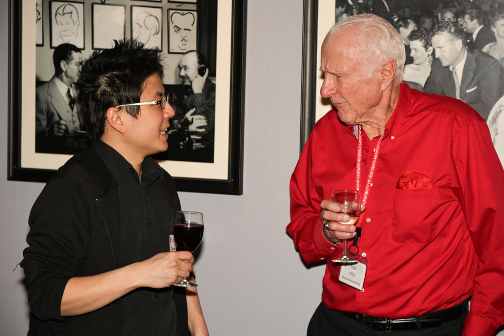 Tom Kies speaks to another alum