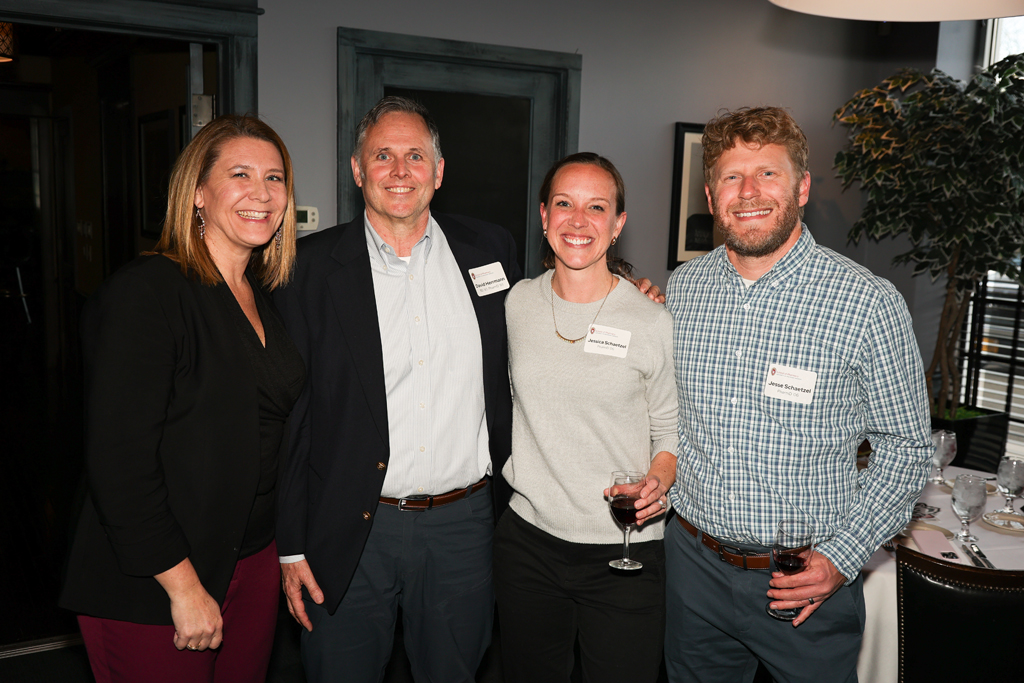 Melissa Theesfeld, David Hermann, Jessica and Jesse Schaetzel smile in a group