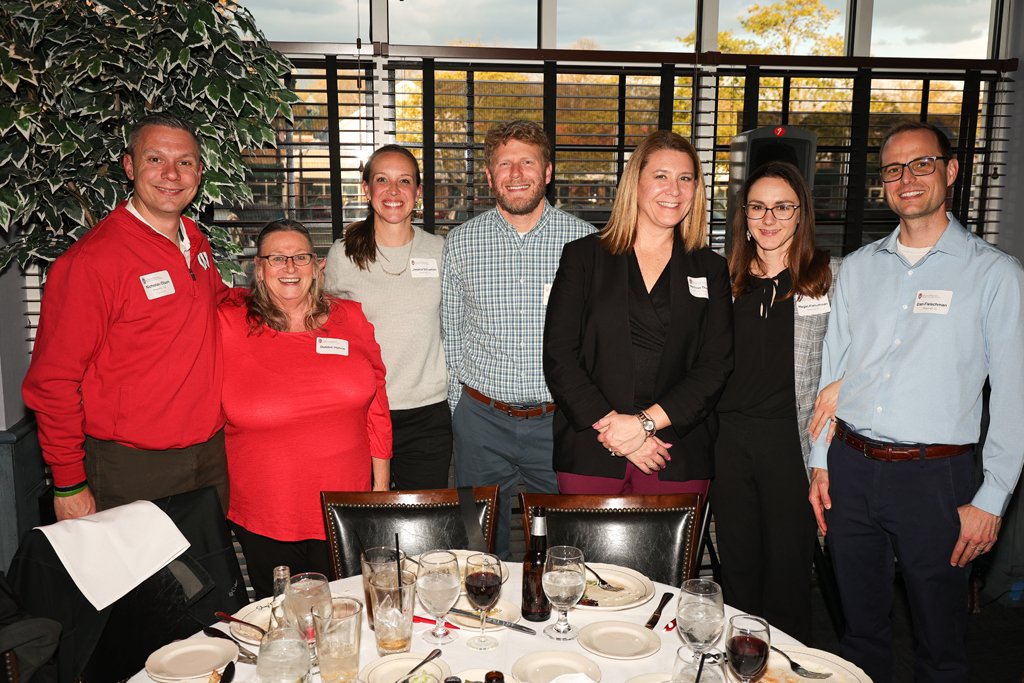 A group of alumni , including Dan Fleischman, Nick Olson, Melissa Theesfeld
