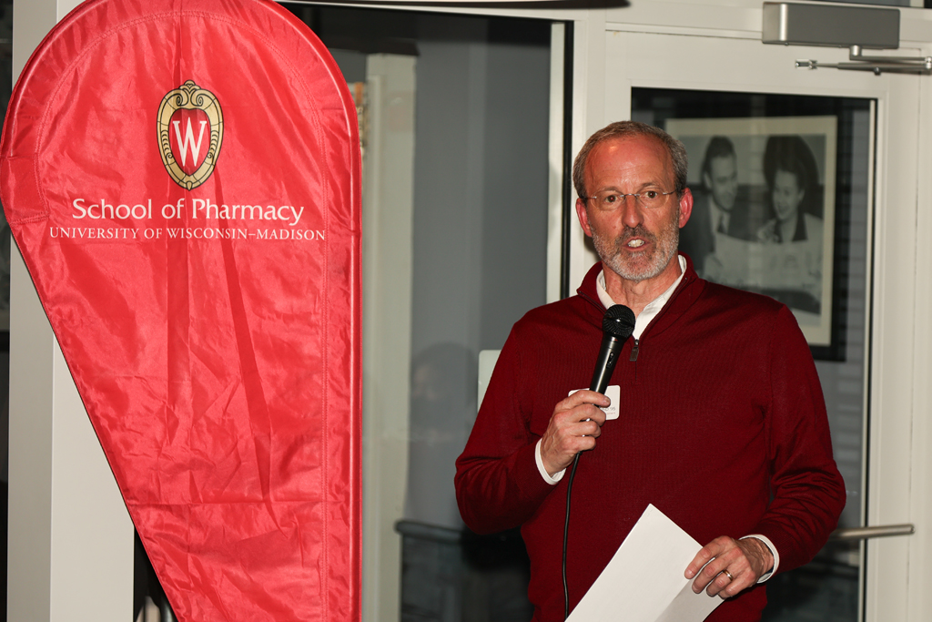 Dave Mott speaks with a microphone in his hand