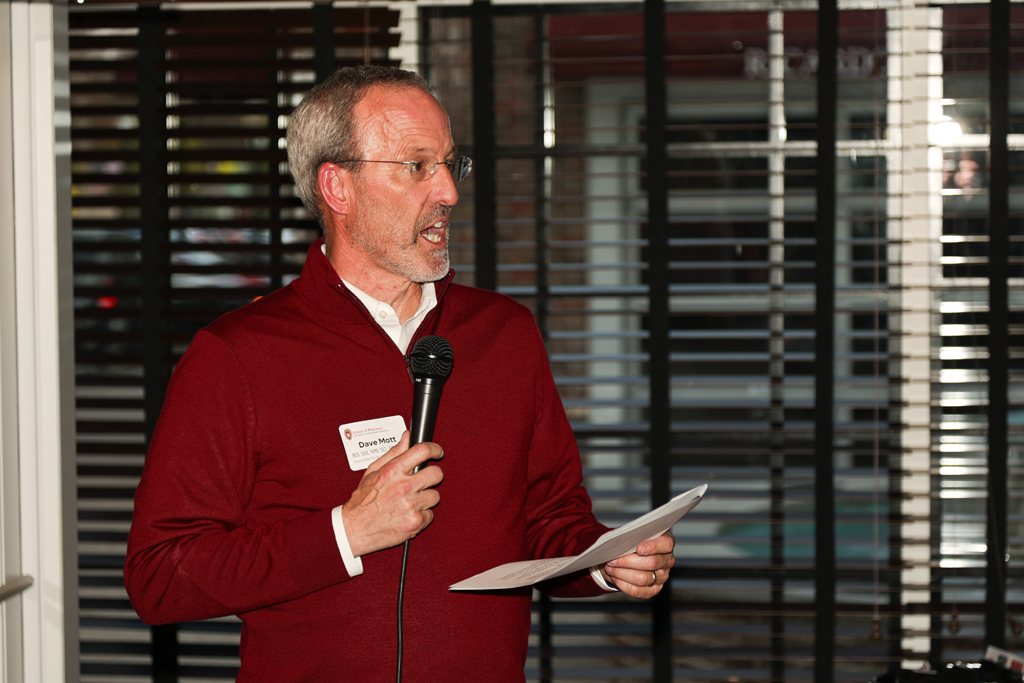 Dave Mott speaks with a microphone in his hand