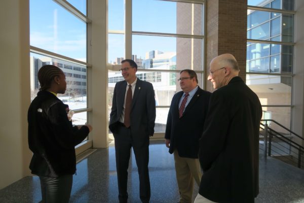 IMG_8436 Cierra Brewer speaking to Provost Karl Scholz at the entrance of Rennebohm Hall with Steve Swanson and Ron Burnette