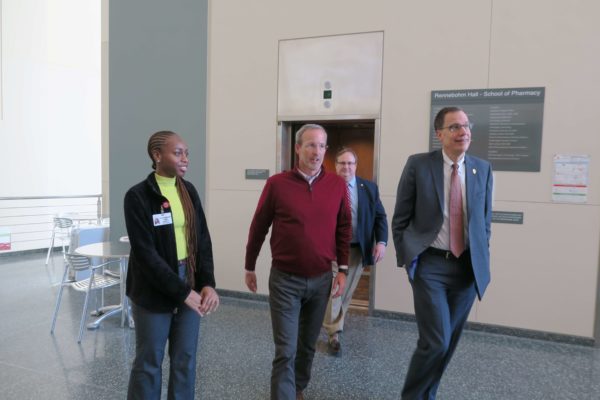 IMG_8500 Provost Karl Scholz walking through Rennebohm Hall with Dave Mott, Cierra Brewer, and Dean Steve Swanson