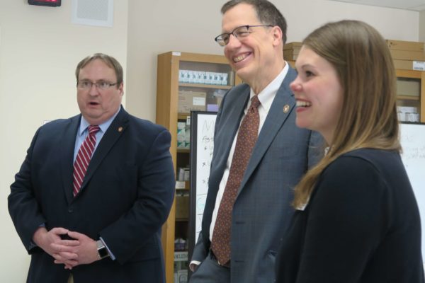 IMG_8640 Side shot of Steve Swanson, Provost Karl Scholz, and Andrea Porter smiling