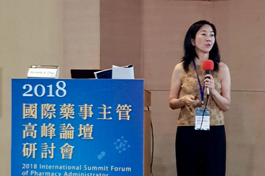 IMG_9135 Michelle Chui in Taiwan speaking at China Medical University and Taipei Medical University speaking at podium