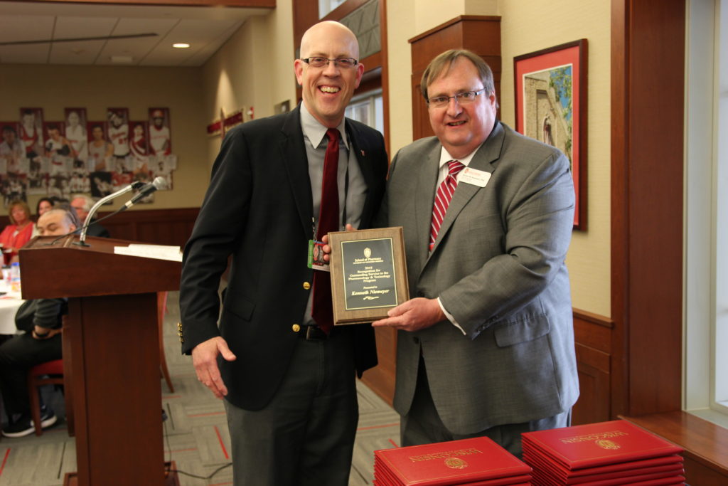 IMG_9465 Ken Niemeyer with Steve Swanson holding an award